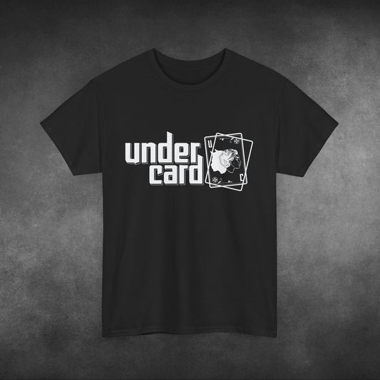 A black t-shirt featuring a minimalist design with the word "Undercard" in bold, white block letters on the left, accompanied by two overlapping playing cards on the right. One card displays a skull graphic. The design has a clean, modern look, with the t-shirt set against a textured grey background.

